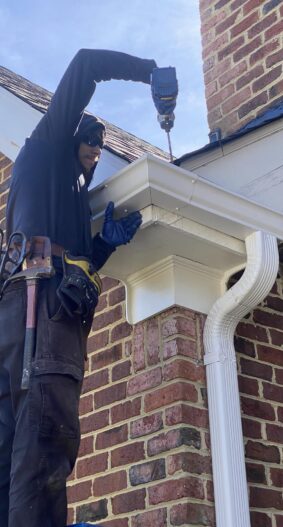 488526822_1236122428516904_1460309069171384702_n A person replacing gutters in Smithfield, VA and Southside, VA