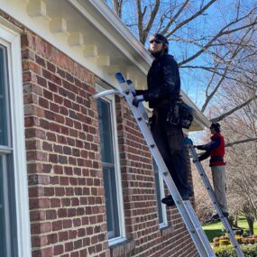 488924788_1236122168516930_7436795938801899487_n A person replacing gutters in Smithfield, VA and Southside, VA