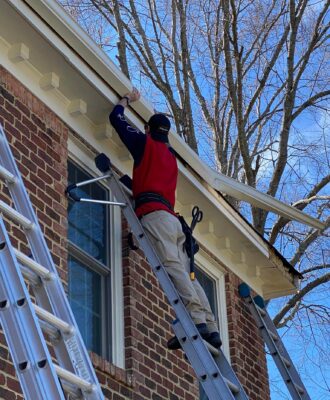 489180698_1236122165183597_5490537782639550449_n A person replacing gutters in Smithfield, VA and Southside, VA